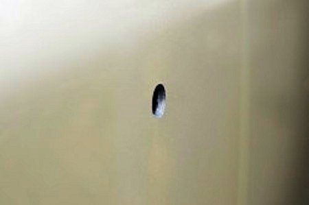 Empty hole in back bumper